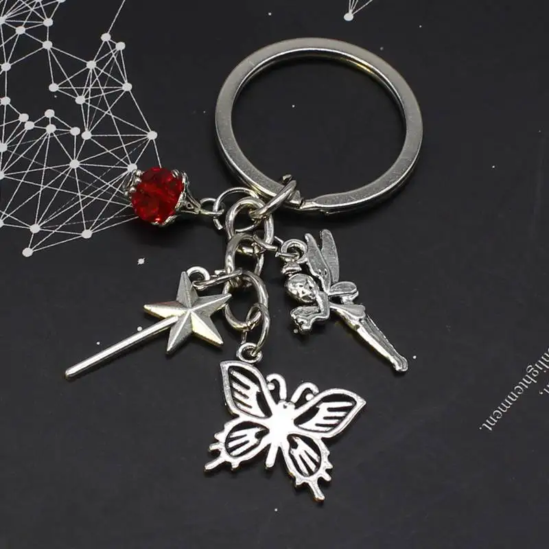 1 kelebek anahtarlık kırmızı boncuk metal aksesuarları anahtarlık peri sihirli değnek kolye takı araba anahtarlık hediye Görüntü 0